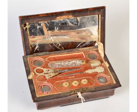 An early 19th century Palais Royale sewing box with an exotic wood veneer, studded with faceted steel, the interier with a fe