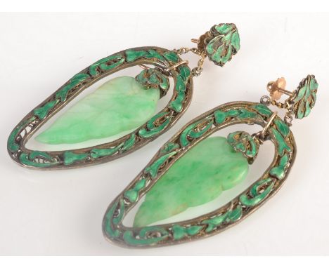 A pair of impressive Chinese green enamelled, silver filigree leaf shaped earrings, at the centre of each a carved pendant ja