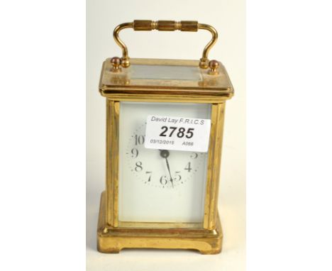A French Queen Mary presentation brass carriage clock with crowned M dated Feb 28 1922.