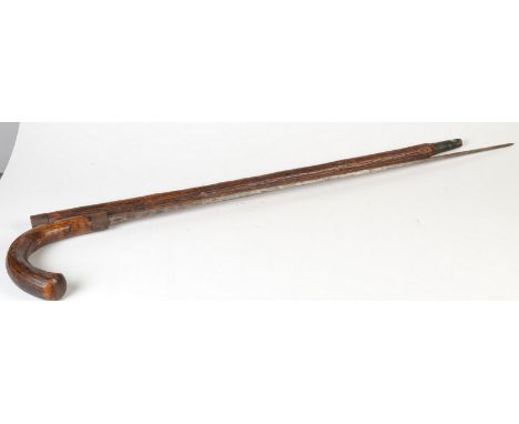 A 19th century swordstick with iron mounts and square section blade, length of blade 77cm.