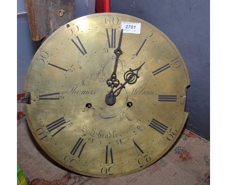 A brass long case clock movement by Thomas Holmes Cheadle, diameter 34.8 cm, together with its oak hood.