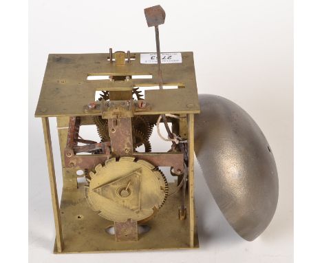 A brass clock movement.