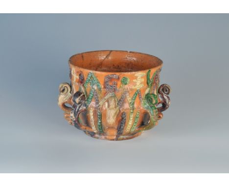 An early 18th century, highly decorated, lead glazed, earthenware 'tyg' or posset pot. 
Height: 14.6 cm Diameter: 18.5cm
Date