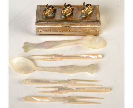 An EPNS ring box, the lid with three "amethysts", together with six mother of pearl spoons and forks. 
