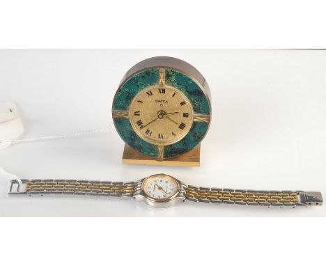 A Swiza gilt paste small alarm clock, the bezel enamelled to simulate malachite, together with a Tissot ladies wrist watch.