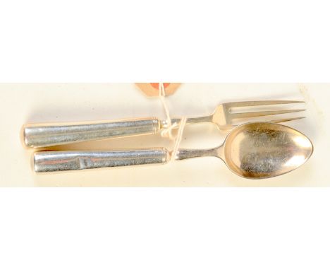 A Victorian silver child's spoon and fork set.