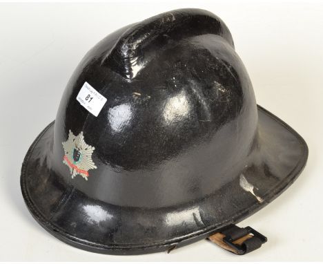 A 1970`s Cornwall Fire Brigade helmet.