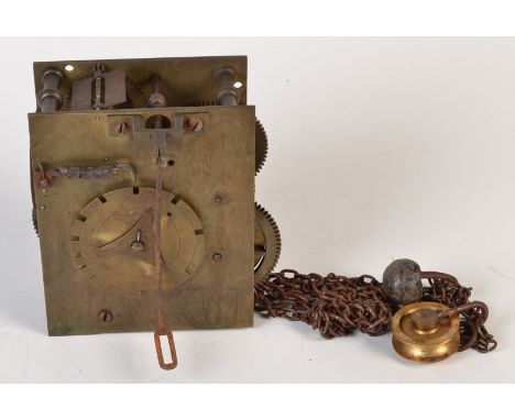 A brass long case clock movement.