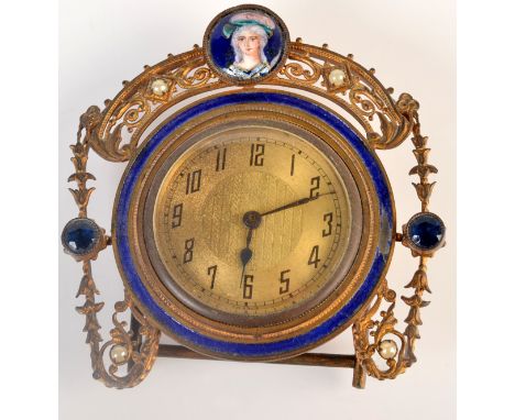 A gilt metal and enamel dressing table timepiece 