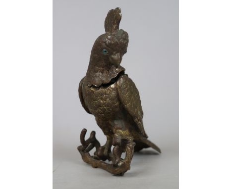 A Victorian Messenger &amp; Sons ormolu novelty cockatoo shaped inkwell, shaped as a cockatoo perched on a branch that acts a