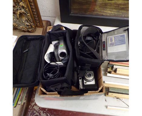 Collection of camera equipment in cases together with camcorder 