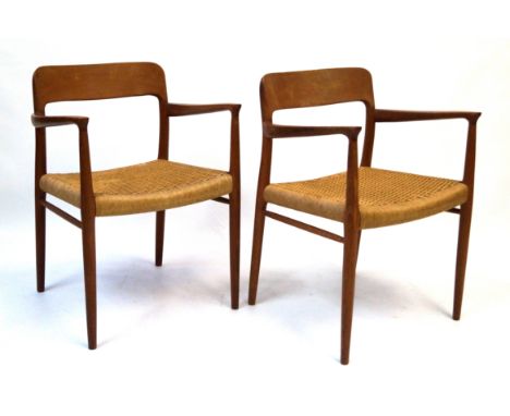A pair of Neils Moller model 75 armchairsDesigned in 1954, by Neils Moller, produced by J.L Moller Denmark, height of backs 7