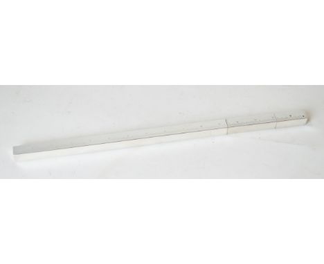 A Christian Dior silver-plated ruler lighter and letter opener Signed to rim, and dated 14-7-98, length 40cm 