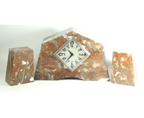 An Art Deco veined marble three piece clock garniture The clock having silvered dial with Arabic numerals, height 21cm  