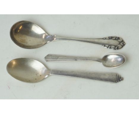 Two Georg Jensen 925 silver spoonsThe first having stepped finial, length 14cm, the second example having cast handle, length