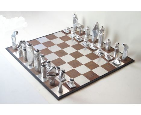 Mary Devlin 'Chess Tubes' contemporary chess setThe chess pieces are made from recycled paint tubes, signed and date 1999 to 