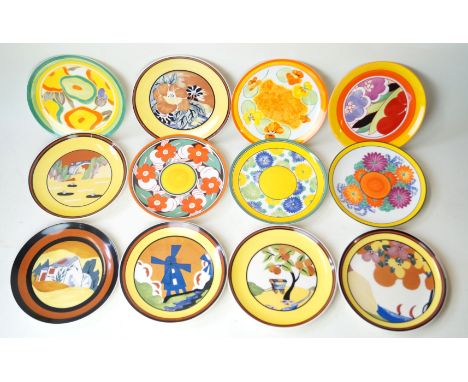 Thirty Wedgwood after Clarice Cliff circular cabinet platesVarious patterns to include Windmill, Lugano, Palermo, Caravan, Fl