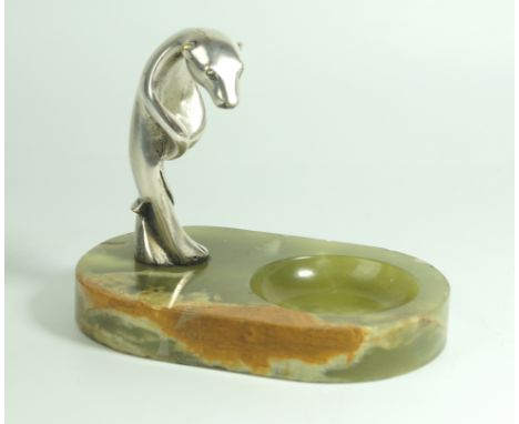 A Franc Art Deco silver-plated figural ashtray Having silver-plated model of a standing polar bear raised on an onyx plinth b