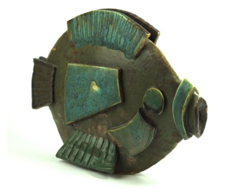 A contemporary studio pottery model of a fishHaving relief and incised decoration, unmarked, height 24cm, length 33cm    COND