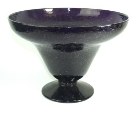 A contemporary studio glass footed conical bowlDecorated with air bubbles on an amethyst coloured body, smooth pontil mark to