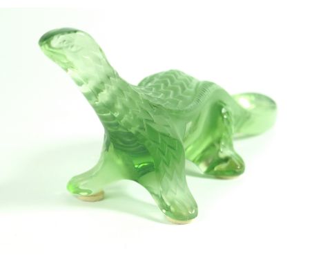 A Lalique France green glass model of a lizardHaving relief decoration, original paper label and signed, length 13cm   CONDIT