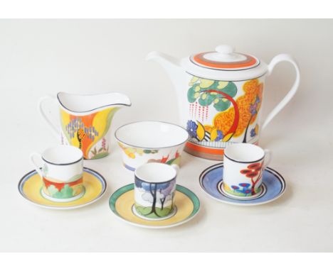 A Wedgwood after Clarice Cliff coffee service Decorated in various patterns to include Cornwall, Windbells and Secrets, compr