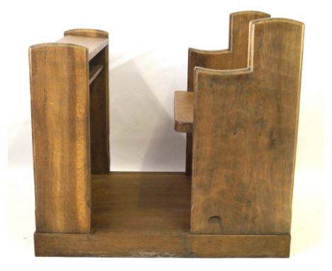 A Robert Mouseman Thompson light oak ecclesiastic lectern Having Adzed decoration in parts, height 96cm    CONDITION REPORT: 