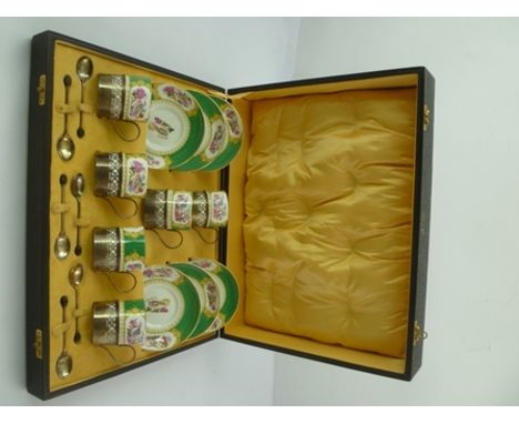 BARKER BROS LTD. A PRESENTATION BOXED SET OF SIX SILVER MOUNTED "OLD ENGLISH" CHINA COFFEE CANS AND SAUCERS & BEAN TERMINAL C