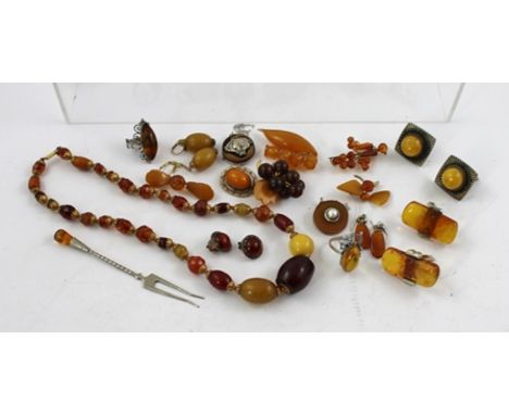 A LARGE COLLECTION OF AMBER JEWELLERY to include some Baltic items, boxed cufflinks in original box, five brooches, two pairs