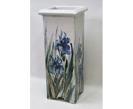 A 20TH CENTURY SQUARE SECTIONED GLAZED STONEWARE STICK STAND, hand painted floral decoration, 54cm high x 16cm square (intern