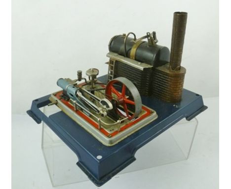 A WILESCO HORIZONTAL LIVE STEAM ENGINE, having black finished boiler, single piston with governor and red aluminium fly wheel