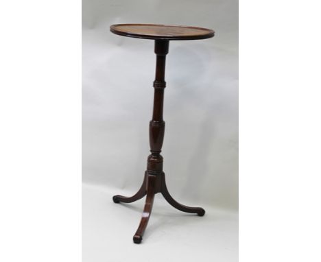 A 19TH CENTURY MAHOGANY DISH TOP WINE TABLE on turned stem and tripod supports, 37cm diameter top 