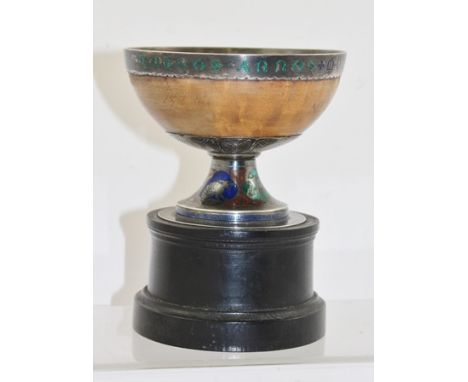 A GOTHIC REVIVAL CHALICE, considered to have been designed by William Burges (1827-1881). The maple bowl mounted with a silve