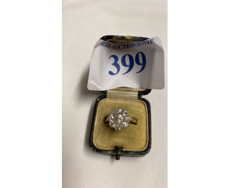 Sale Item:    FLOWER DIAMOND RING SIZE Q   Vat Status:   No Vat   Buyers Premium:  This lot is subject to a Buyers Premium o