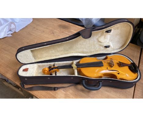  Sale Item:    CASED 4 STRING VIOLA   Vat Status:   No Vat   Buyers Premium:  This lot is subject to a Buyers Premium of 15% 