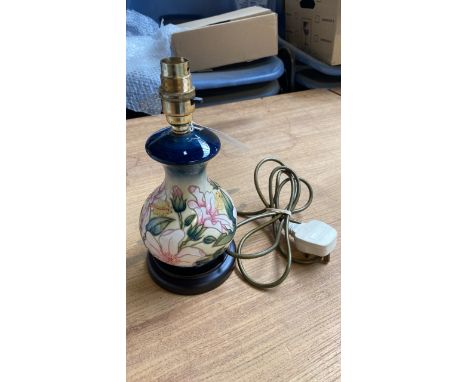  Sale Item:    HIBISCUS MOON MOORCROFT TABLE LAMP  Vat Status:   No Vat   Buyers Premium:  This lot is subject to a Buyers Pr