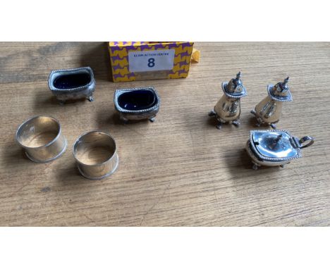  Sale Item:    BOX SILVER CONDIMENTS &amp; NAPKIN RINGS  Vat Status:   No Vat   Buyers Premium:  This lot is subject to a Buy