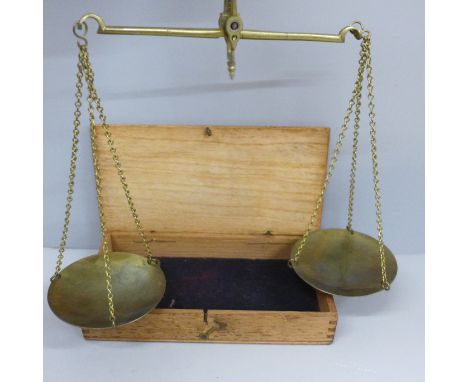 A cased set of balance scales and weights 