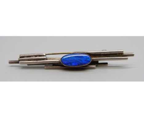 A Modernist white metal and opal set bar brooch, 7cm