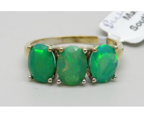 A silver gilt blue opal ring, U