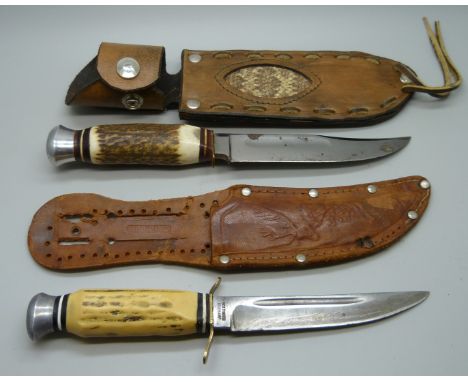 Two hunting knives, one Solingen Germany and one with a snakeskin panel leather scabbard **PLEASE NOTE THIS LOT IS NOT ELIGIB