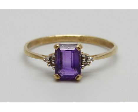 A 9ct gold and amethyst ring with diamond shoulders, 1.6g, R/S