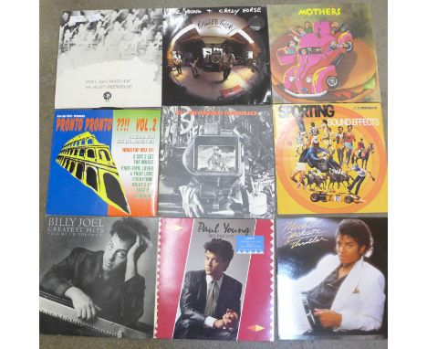 Sixteen LP records, The Velvet Underground, Neil Young, Michael Jackson, etc.