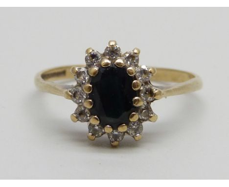 A 9ct gold sapphire and diamond cluster ring, 1.9g, R