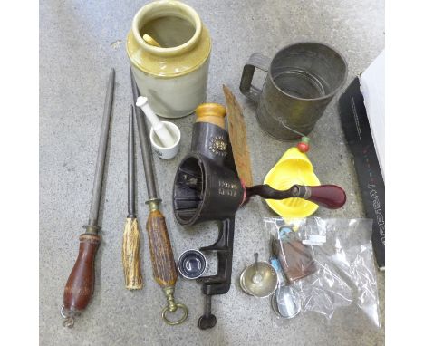 A Spong marmalade slicer, a Goebel juicer, a Bee flour sifter, caddy spoons and other kitchenalia