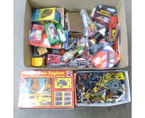 A collection of model vehicles, toys, games and gaming figures