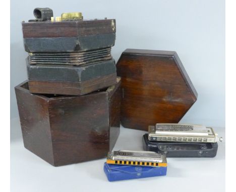 A Victorian C. Wheatstone concertina and two Hohner harmonicas, The Chromomica and Blues Harp