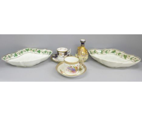 A Coalport cabinet cup and saucer, a Royal Worcester cup and saucer, handle with staple repair, stamped 76, a small Royal Cro