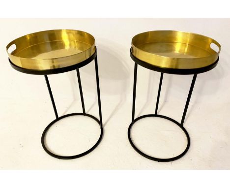 SIDE TABLES, a pair, 57cm x 36cm diam., gilt metal tray tops, black metal frames (2) 