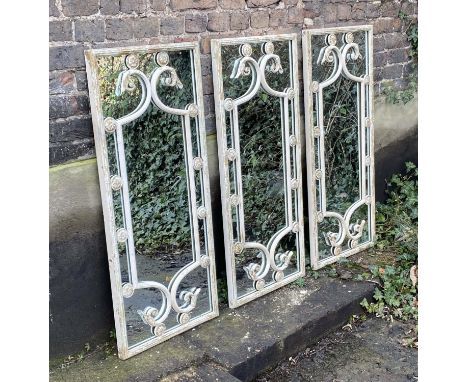 ARCHITECTURAL WALL MIRRORS, 111cm high, 48cm wide, a set of three, Regency style, white painted. (3) 